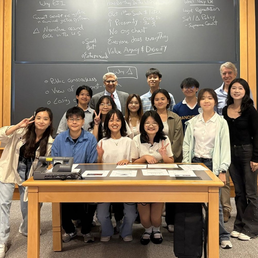 Taiwanese fellows with College for Social Innovation faculty in a Boston classroom
